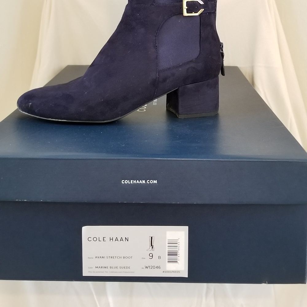 Navy blue tall boot.